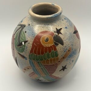 Handcrafted Colorful Parrot Ceramic cut out tea light holder.